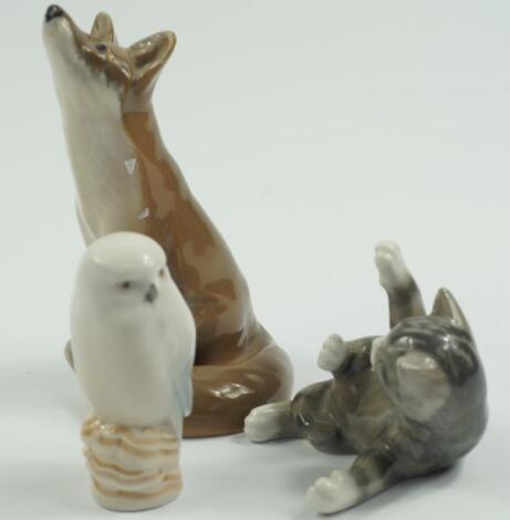 A Royal Copenhagen porcelain figure of a seated fox