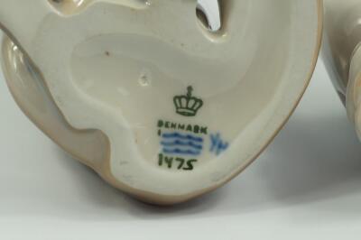 A Royal Copenhagen porcelain figure of a seated fox - 2