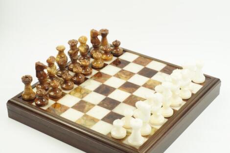 An Italian white and brown onyx chess set