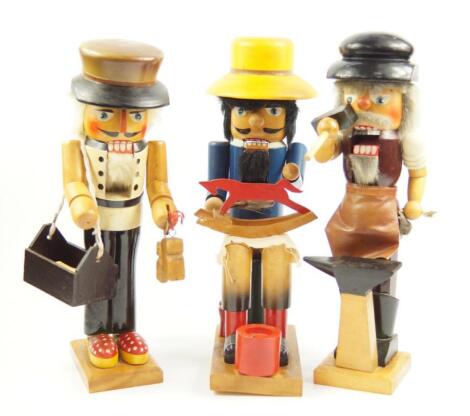 Three German wooden figural novelty nut crackers