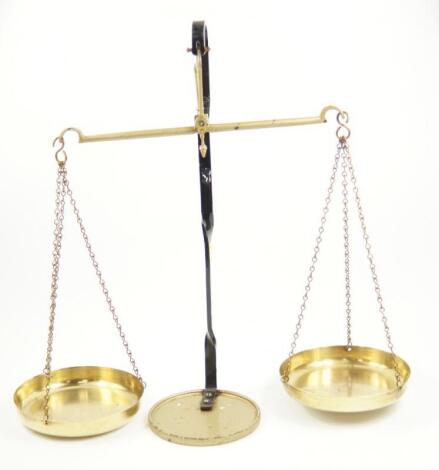 A set of cast iron and brass balance scales