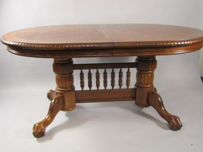 An oak draw leaf dining table