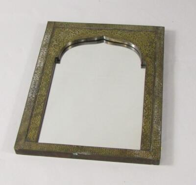 An Indian hardwood and brass inlaid wall mirror