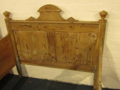 A pine single bed with carved headboard - 2