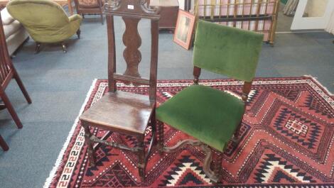 An 18thC oak hall chair