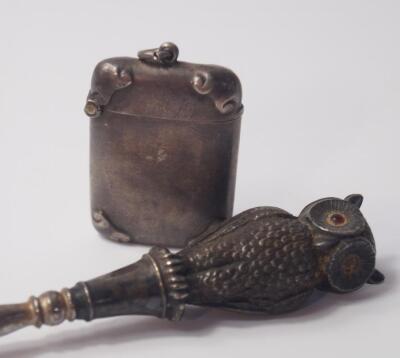 An Edwardian button hook with silver owl handle