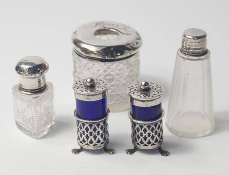 A George V cut glass smelling salts bottle with silver screw lid