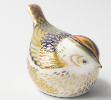 A Royal Crown Derby Imari porcelain paperweight modelled as a Firecrest.