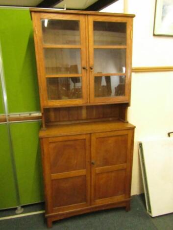 An early 20thC oak kitchen dresser