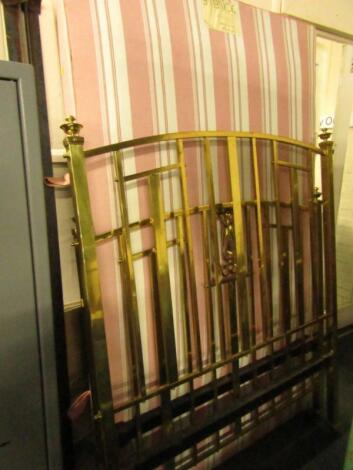 A Victorian brass double bed with Art Nouveau decoration