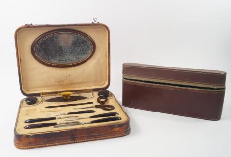 A lady's mid 20thC faux tortoiseshell manicure set