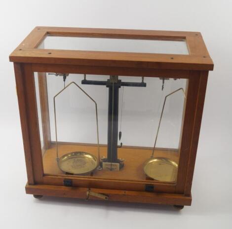 A set of Philip Harris brass and iron balance scales