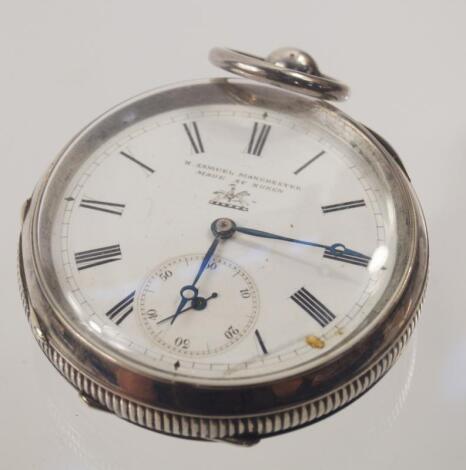 A large silver cased pocket watch by H Samuel