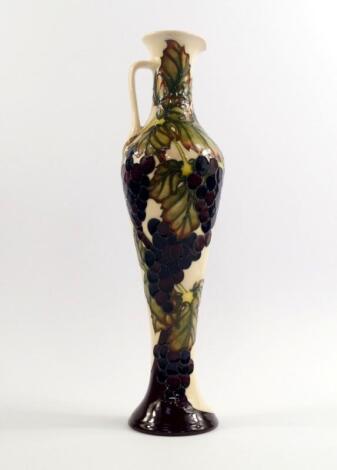 A Moorcroft pottery ewer decorated in the Grapevine pattern