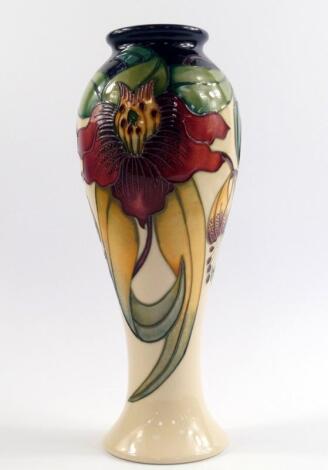 A Moorcroft pottery vase decorated in the Anna Lily pattern