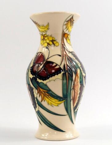 A Moorcroft pottery vase decorated in the Butterflies pattern