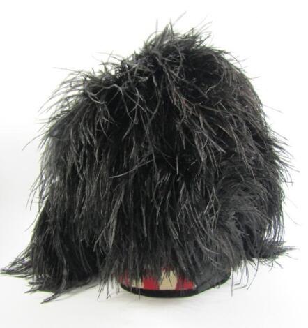 A Scottish military tail feather bonnet.