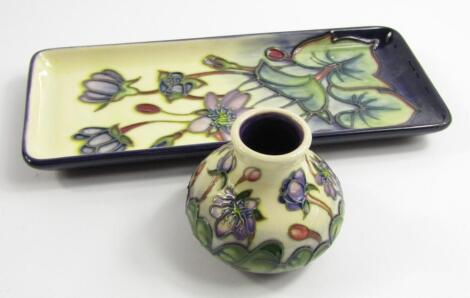 A Moorcroft pottery rectangular dish decorated in the Hepatica pattern