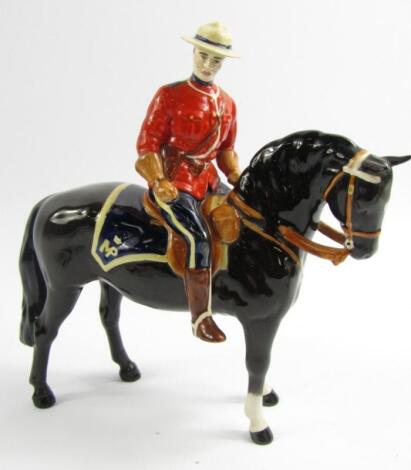 A Beswick pottery figure of a Canadian Mounted Policeman