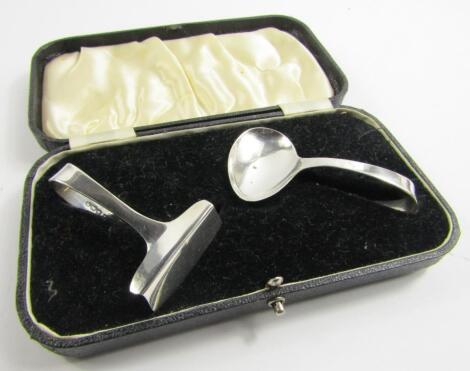 A George VI silver baby's feeding spoon and pusher