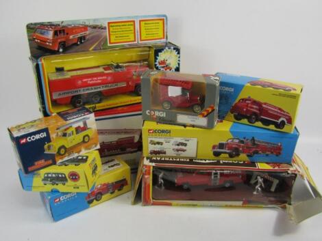 A collection of Corgi die-cast models of fire engines and support vehicles