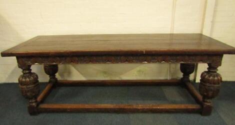 A Victorian oak four plank refectory table