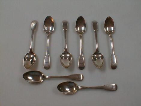 A set of eight William IV silver fiddle pattern teaspoons