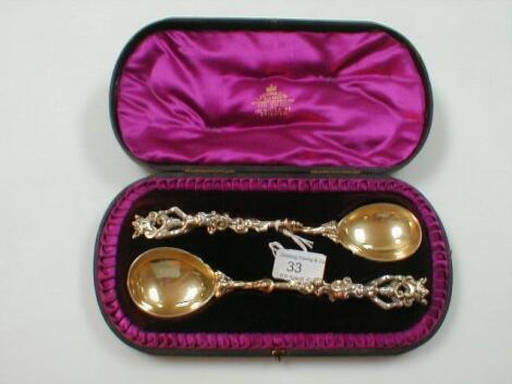 A pair of Polish silver gilt presentation spoons