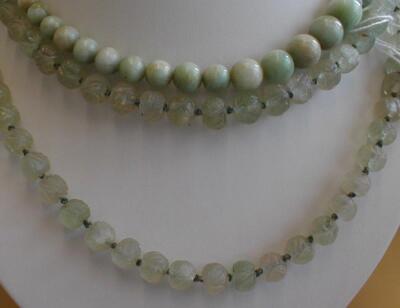 A string of carved jade beads