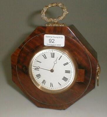 A mahogany cased timepiece