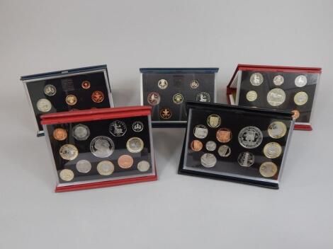 Five Royal Mint proof sets