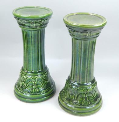 A pair of West German 1960's/70's green glazed pedestals