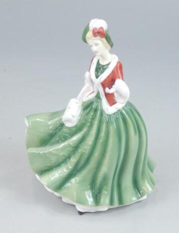 A Royal Doulton porcelain lady