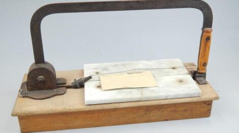 An unusual late 19th/early 20thC cheese wire cutter