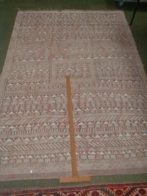 A flat-weave Eastern carpet