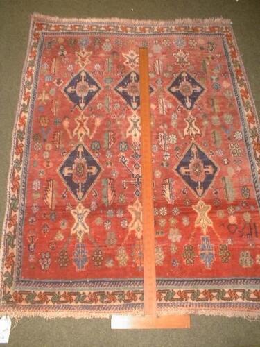 A red ground Turkish rug 4'7" X 3'7"