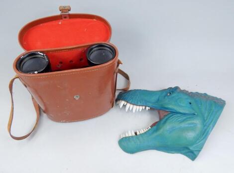 A Trcic Studio cold painted resin model of a T-Rex and a pair of Revue binoculars (cased)