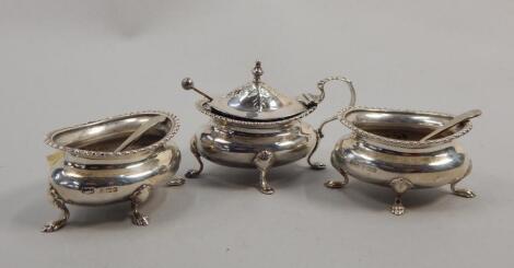 An Edwardian three piece silver cruet