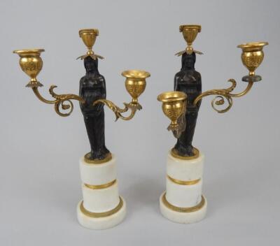 A pair of 19thC bronze gilt metal and marble three branch candelabra