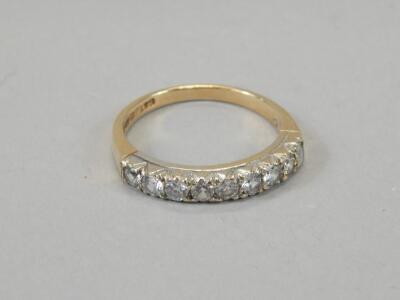 A ladies 9ct gold half eternity ring