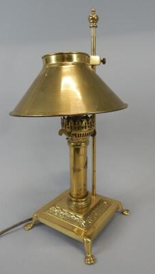 A reproduction brass Orient Express table lamp