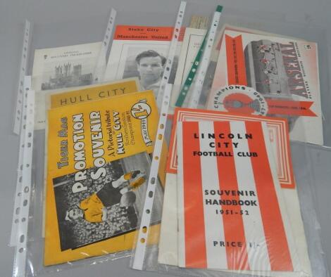 A quantity of souvenir football programmes