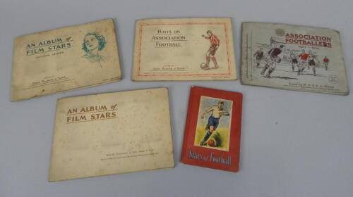 Cigarette cards in albums