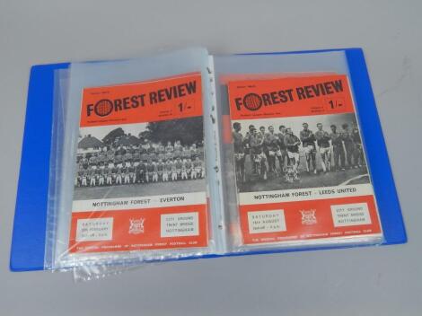 A quantity of football programmes