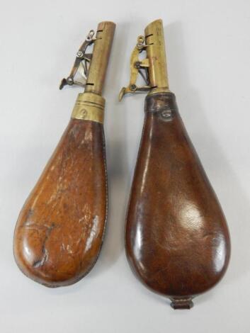 Two brown leather and brass powder flasks