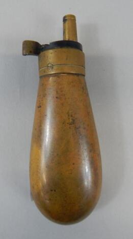 A small brass powder flask