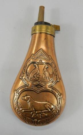 A copper and brass powder flask