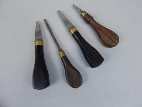 Four hardwood handled screwdrivers for pistols or guns