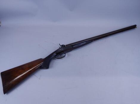 A muzzle loading double barrelled shot gun