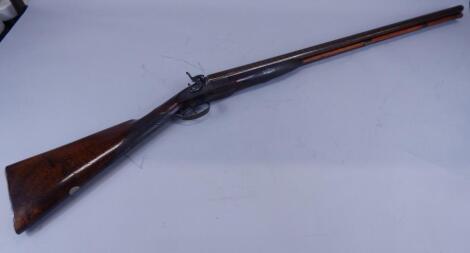 A muzzle loading double barrel shotgun